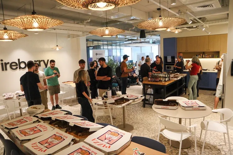 Community meetup photo at Fireberry, with pizzas